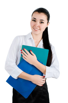 Happy and smiling business woman with folders in her hands. White background. Studio shot
