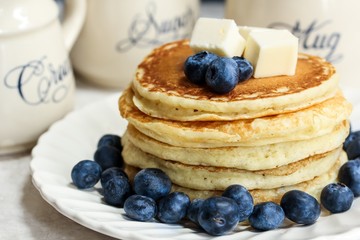 Pancake stack with blueberry and butter