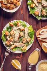 Homemade Chicken Caesar Salad with Cheese and Croutons.