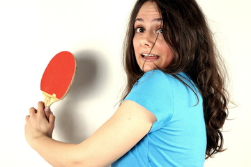 Studio shot of a lady playing table tennis