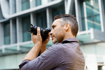 Male photographer taking picture