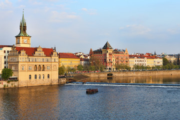 Obraz premium Old Town ancient architecture and Vltava river pier in Prague