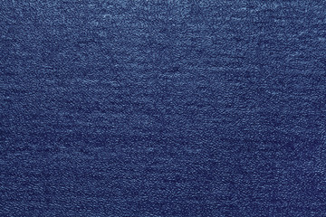 Dark blue stamped cardboard texture