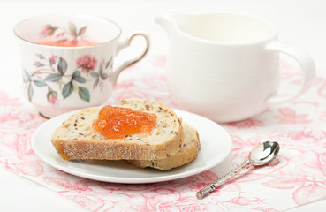 Watermelon Jam, Herbal Tea, Marshmallows. White Wooden Table