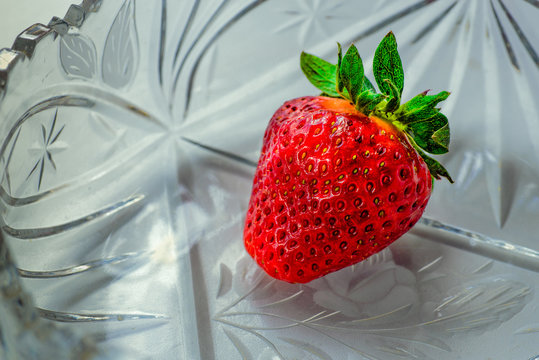Strawberry in a crystal vase.