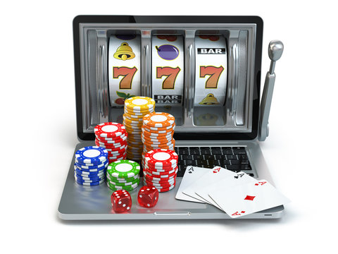 Casino online concept, gambling. Laptop slot machine with dice a