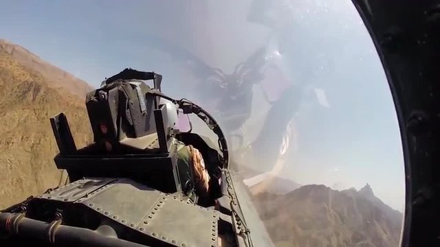 POV shots from the cockpit of a fighter plane.