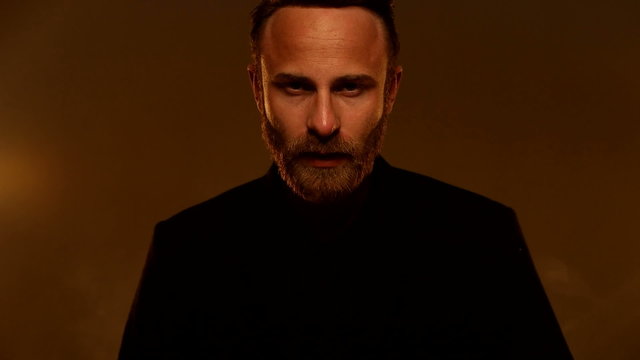 handsome fashion model man portrait looking at the camera 