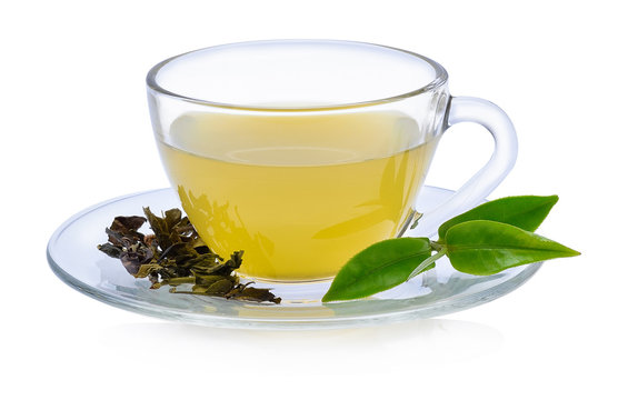 Glass Cup Tea with green leaves on white background