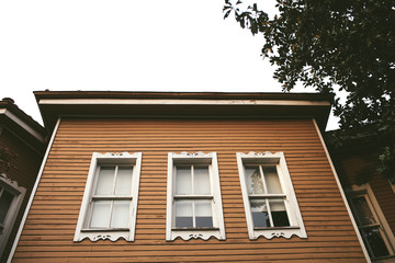 wooden house facade with windows