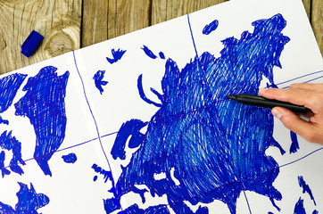 Map of the world drawn by hand on paper