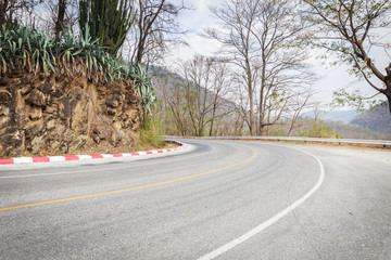 Road curve in the mountain, dangerous be ware to drive