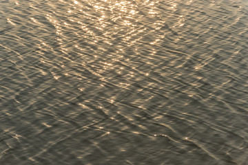 seamless texture warm color shining sunset water surface