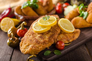 Chicken schnitzel with croquettes