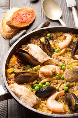 Traditional seafood paella in the pan