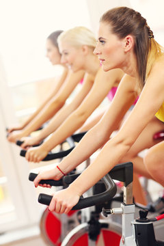 Sporty Women On Spinning Class