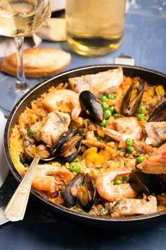 Traditional seafood paella in the pan