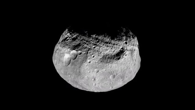 NASA animation of an asteroid spinning, with color enhancements.