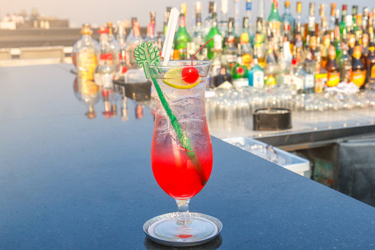 Fruit Fresh Cocktail On The Table At Counter Bar From Rooftop And Restaurant , Selective Focus