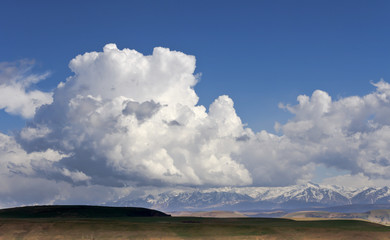 A giant cloud over the mountains of the Great Caucasus.Russia.
