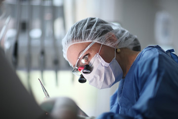 Tensed face of performing surgeon