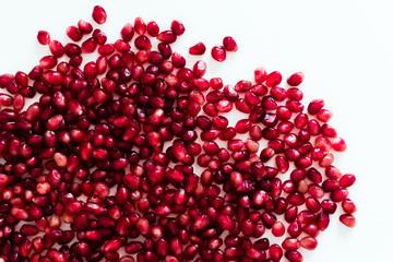 Berries of a pomegranate on a white background