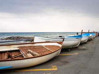 Small fishing boats lying on the shoreline