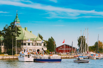 Fototapeta premium Harbour And Quay Yacht Stand At Pier, Jetty In Summer Day neat H