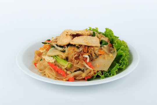 Rice Noodles Stir-fried with Chicken (Guay Tiew Kua Gai), Thai Street Food.