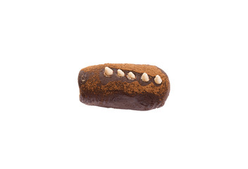 Pastry sweet cake made of biscuits with cocoa powder and rum decorated with cream side view isolated toned