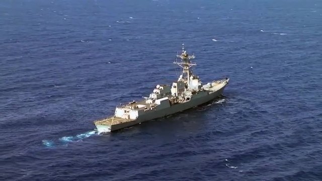Aerials above a Navy destroyer ship.