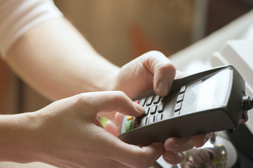 Woman pay by credit card