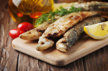 Traditional russian fish smelt on the wooden table