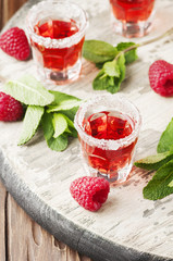 Cold Raspberry cocktail with mint