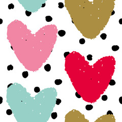 Red, pink, mint and gold hearts on the polka dots background. Vector seamless pattern for Valentines day. © ojardin