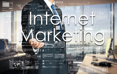 Businessman presenting text Internet Marketing on virtual screen