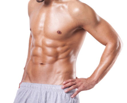 Fit man with beautiful torso, isolated on white background