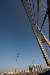 bridge steel ropes constructions on sky  background