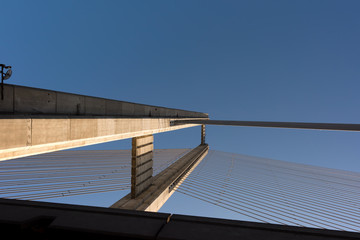 bridge steel ropes constructions on sky  background