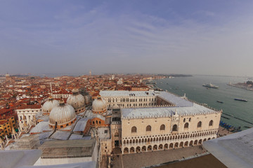 Fototapeta na wymiar San Marco Basilica domes, Doges Palace and roofs of venetian hou