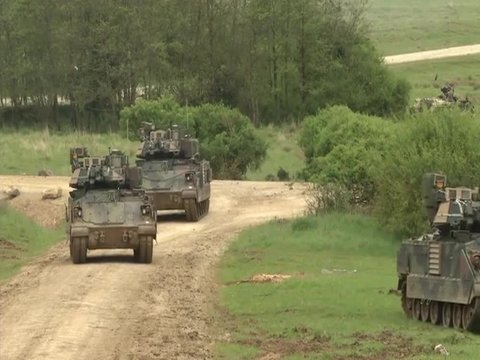 M 1 Abrams tank moves along a road in Albania.