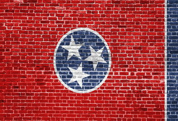 Tennessee US flag painted on old vintage brick wall