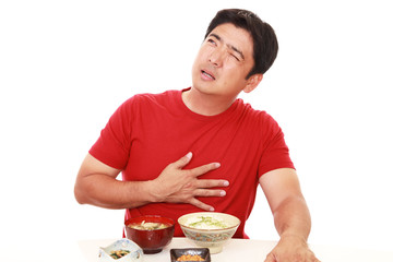 食欲不振の男性