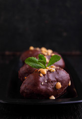 potato cake on the plate on a black background. Russian kitchen.