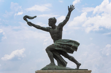 Statue of a torch bearer "progress"