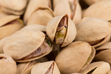 Pistachio nuts arranges as background