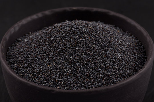 poppy seeds in a stone bowl