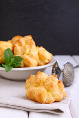 eclair cake in a plate on a black background