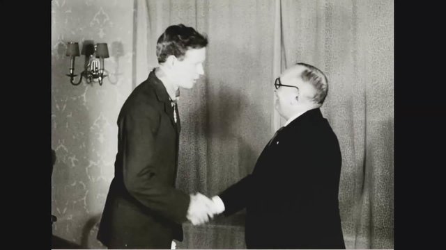 The French ambassador to the United States gives Col. Lindberg a medal of honor in 1931