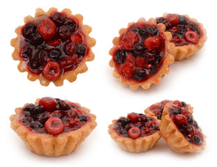 Set of cupcakes with raspberry and cherry isolated on white background